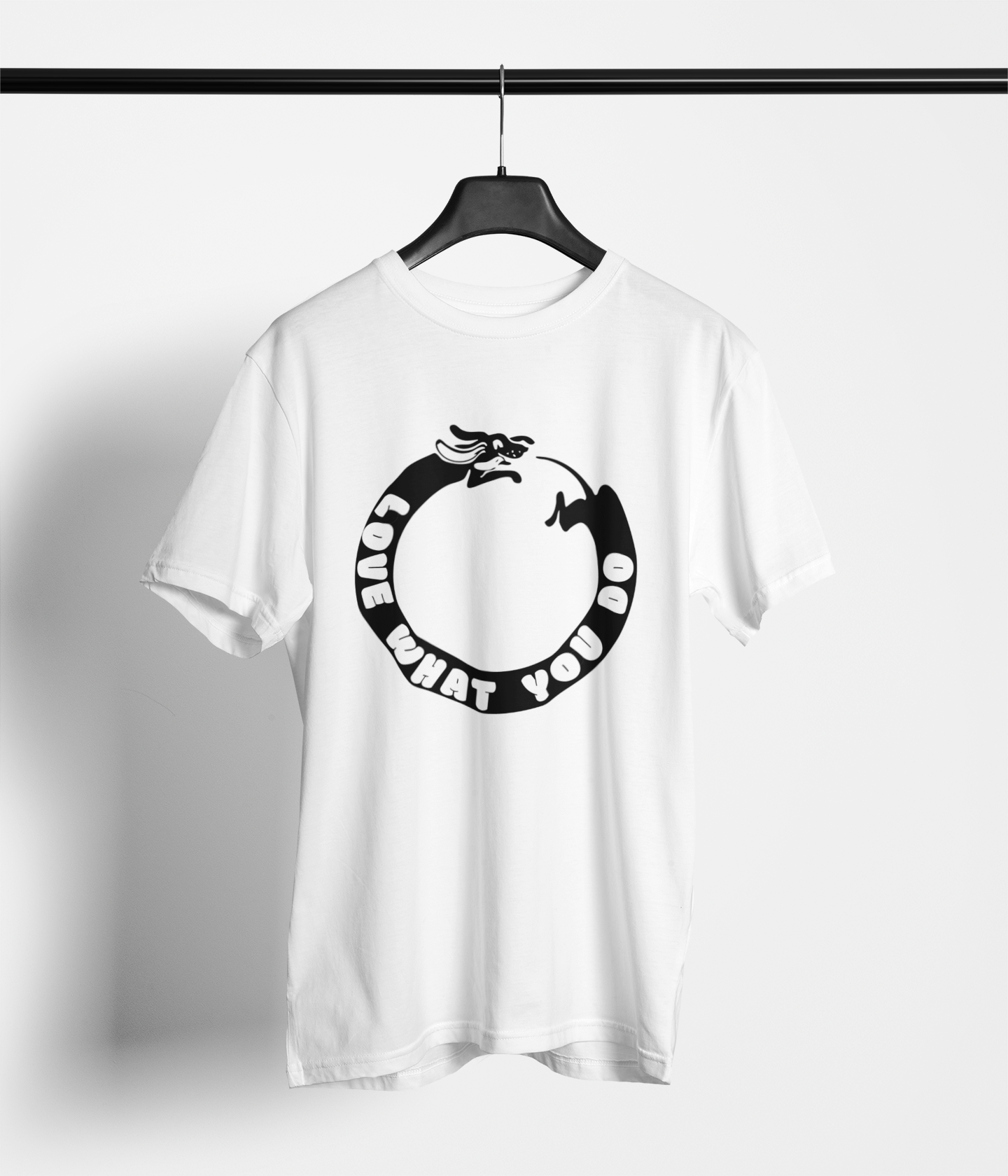 White tee with ‘Love What You Do’ and dog chasing its tail