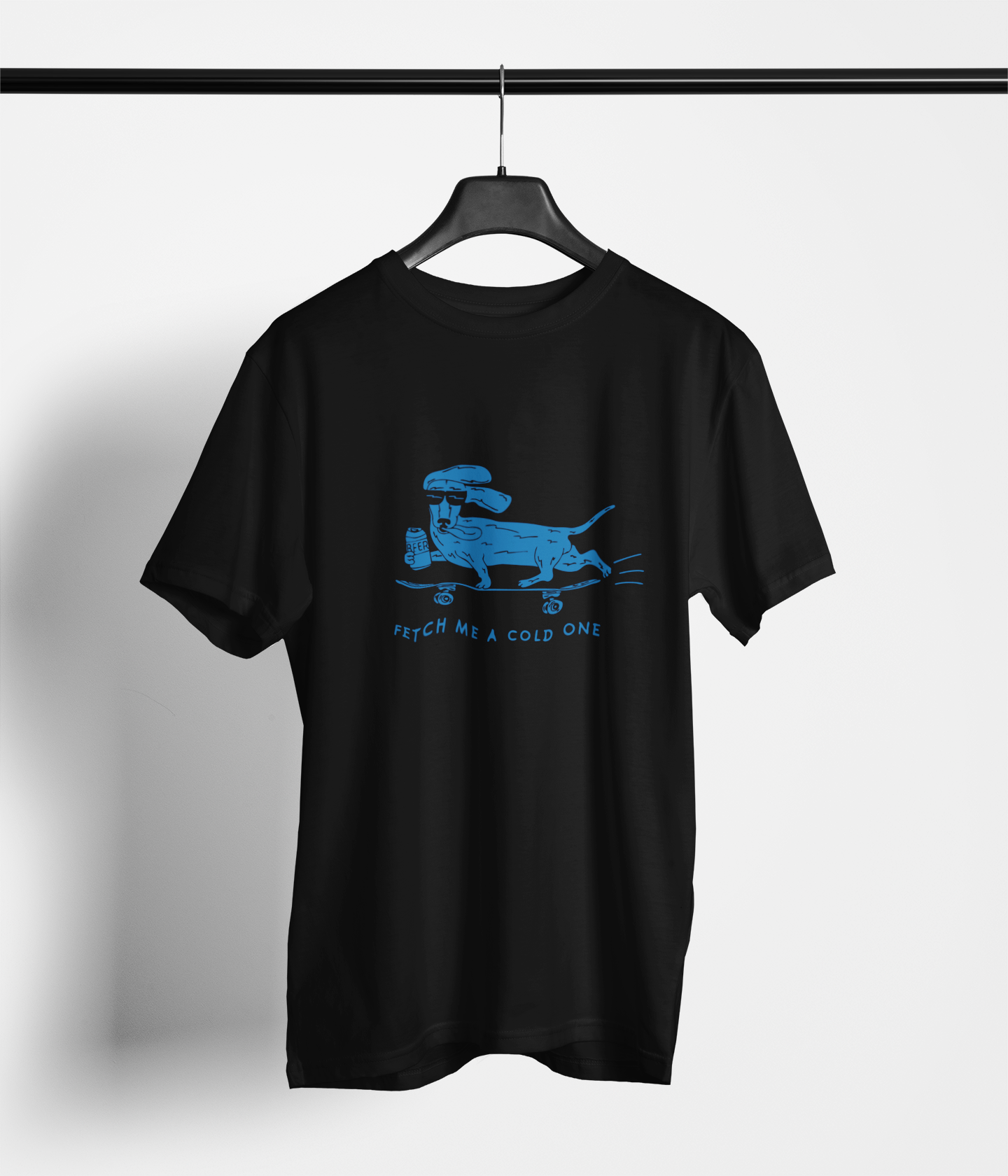 Black t-shirt with “Fetch Me a Cold One” skateboarding dog graphic