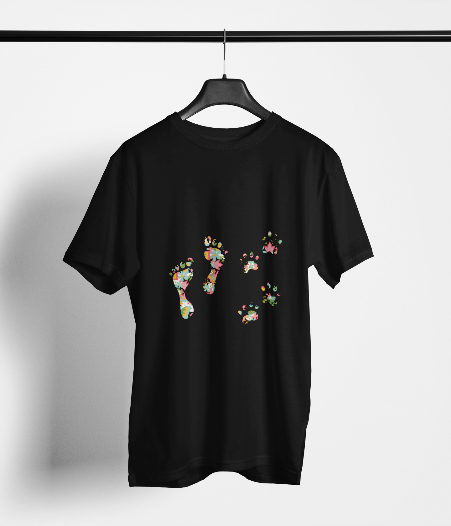 Black tee with colorful floral human footprints and dog paw prints