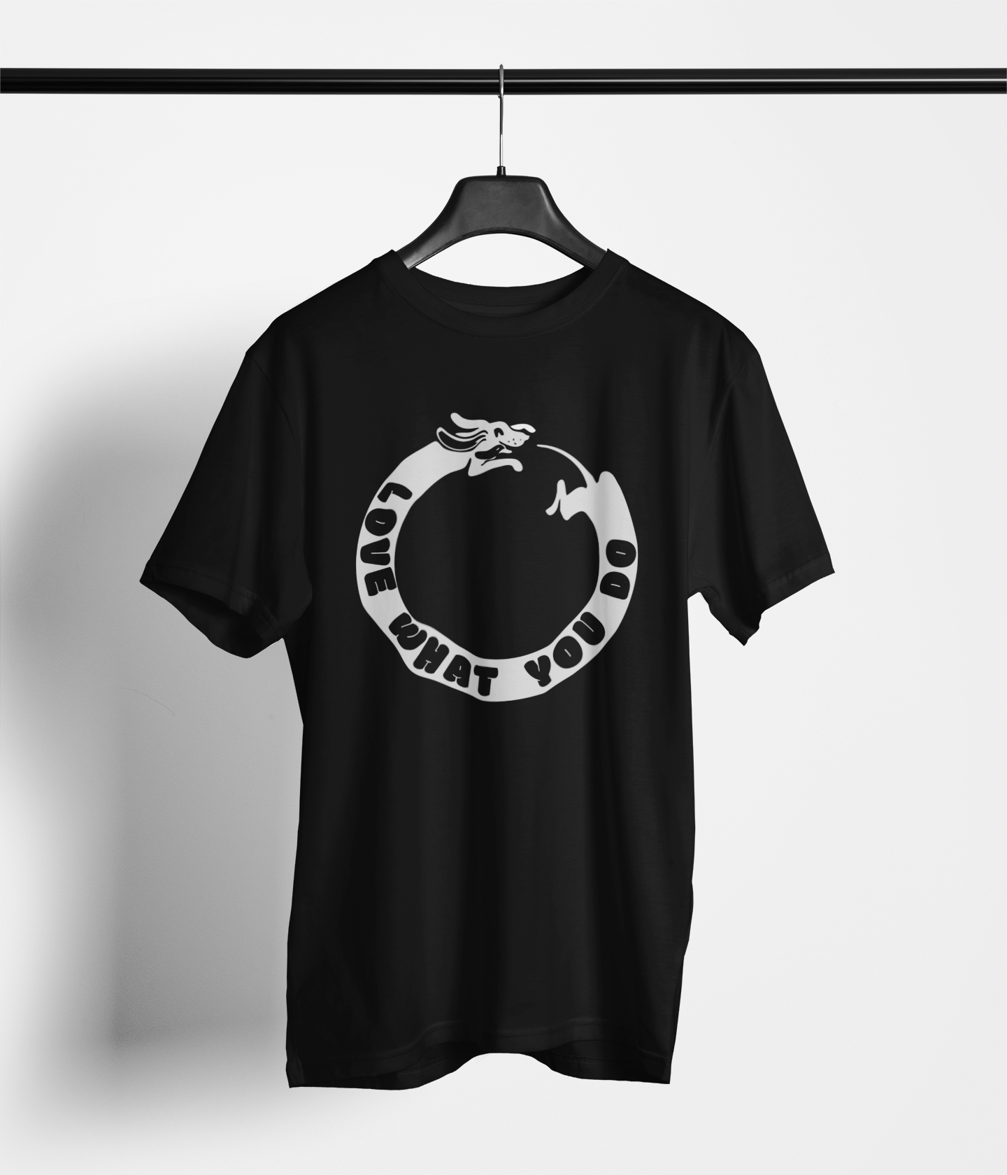 Black tee with ‘Love What You Do’ and dog chasing its tail