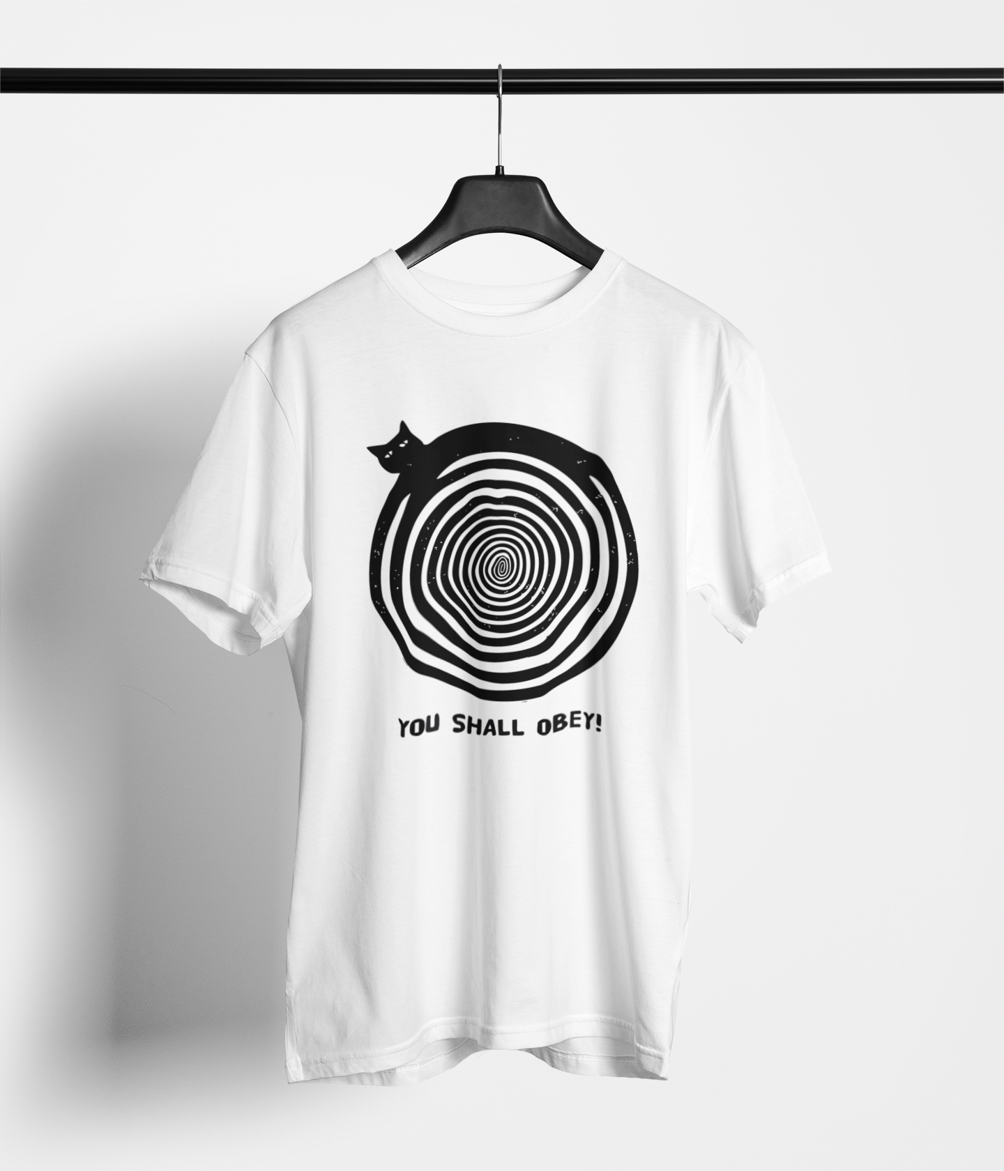 White tee with hypnotic spiral cat and ‘You Shall Obey’